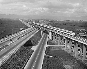 High Speed Train Prints: Japanese Supertrain Speeds Over Highway