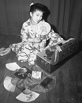 Kimono Prints: Japanese Woman Looking at Her Mementos