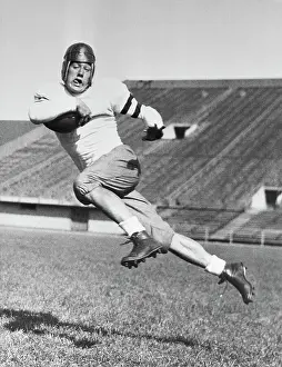 Jay Berwanger Running with Football