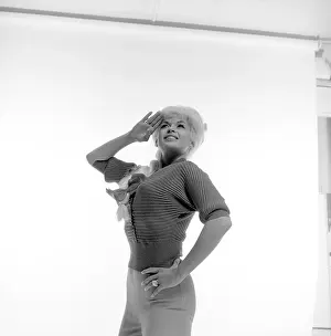 Prints of NEW YORK - 1964: Actress and model Jayne Mansfield poses for a portrait in 1964 in New York City, New York. Taken for the 1964 pinup book Jayne Mansfield For President Hollywood's Blonde Bombshell in Focus: Jayne Mansfield Portrait Session