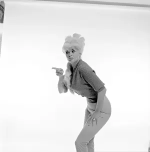 Prints of NEW YORK - 1964: Actress and model Jayne Mansfield poses for a portrait in 1964 in New York City, New York. Taken for the 1964 pinup book Jayne Mansfield For President Hollywood's Blonde Bombshell in Focus: Jayne Mansfield Portrait Session