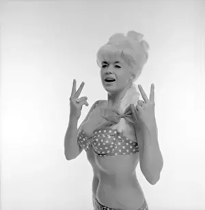 Prints of NEW YORK - 1964: Actress and model Jayne Mansfield poses for a portrait in 1964 in New York City, New York. Taken for the 1964 pinup book Jayne Mansfield For President Hollywood's Blonde Bombshell in Focus: Jayne Mansfield Portrait Session