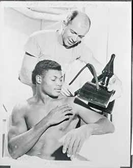 Caroline Prints: JC Caroline Getting Shoulder Treated by Dick Klein