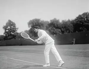 Jean Borotra Holding a Tennis Racquet