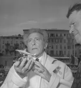 Receiving Prints: Jean Cocteau With Golden Sardine Award