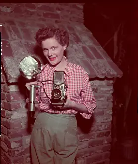 Jean Hagen Holding Camera