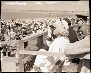 Binoculars Prints: Jean Harlow Watching Air Race