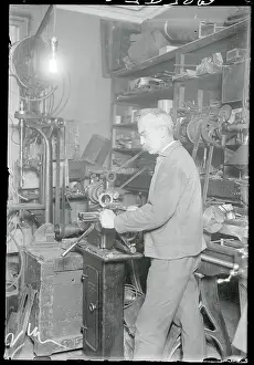 Jean Leroy Working in His Shop