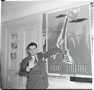 Jean-Paul David Pointing at Poster