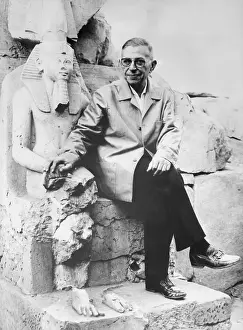 Philosophy Prints: Jean-Paul Sartre Sitting with Egyptian Artifact