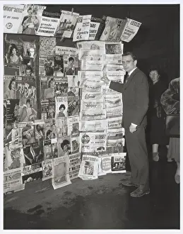 Jean Pierre Guillaume Pausing at Newspaper Stand