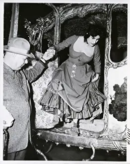 Stagecoach Prints: Jean Renoir Helps Anna Magnani from Coach