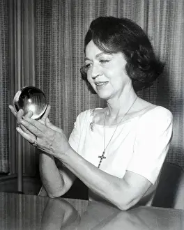 Fortuneteller Prints: Jeane Dixon Holding a Crystal Ball