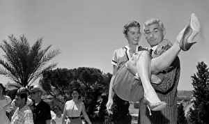 Jeff Chandler Holding Esther Williams
