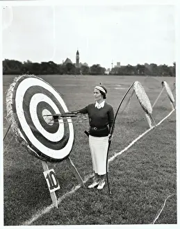 Jennette Baise Standing by Archery Target