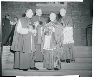 Jerome Hannan Conversing with Colleagues