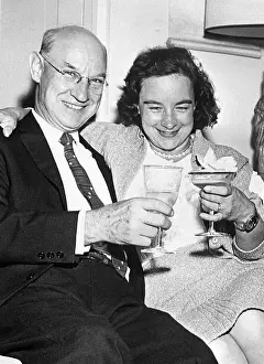 Jerrie Mock Toasting with Her Father