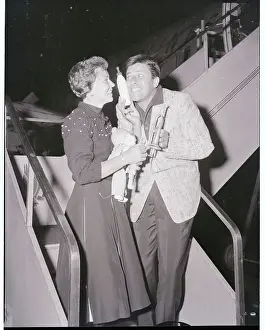 Jerry and Patti Lewis with Toys on Staircase