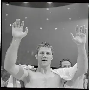 Jerry Quarry Raising Hands in Victory