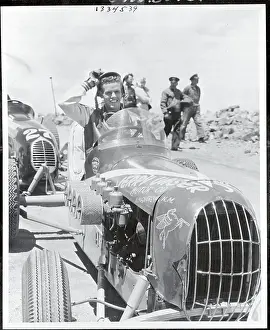 Jerry Unser Waving from His Race Car