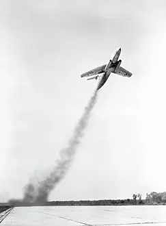 Takeoff Prints: Jet Plane Shown In Steep Takeoff