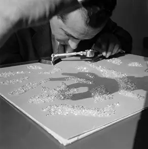 Jeweler Prints: Jeweler Inspecting Polished Diamonds