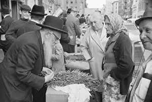 Jewish Man Buys Lulav Sprigs