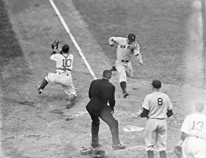 J.Gordon Leaping Over On To Home Plate