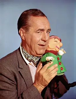 Jim Backus Posing with Mr. Magoo Doll