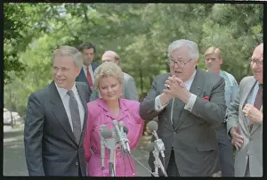 Fort Mill Prints: Jim Bakker Exiting Car with Bible and Flowers