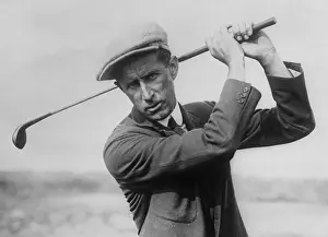 Jim Barnes Holding a Golf Club