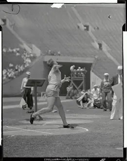 JIm Bausch Throwing Discus at Olympics