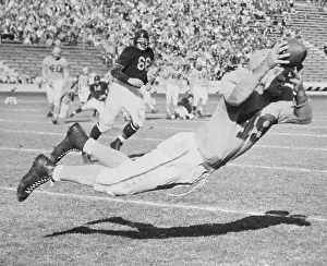Football Uniform Prints: Jim Benton Leaping for Football
