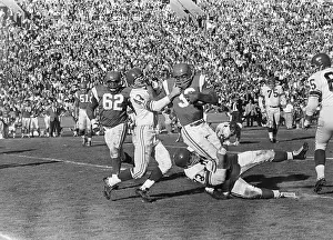 Tackle Prints: Jim Brown (32) is Tackled in Game