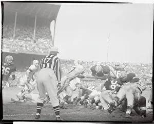 Jim Brown Leaping Over Players