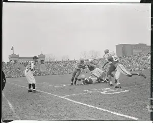 Jim Brown Being Tackled by Opponents