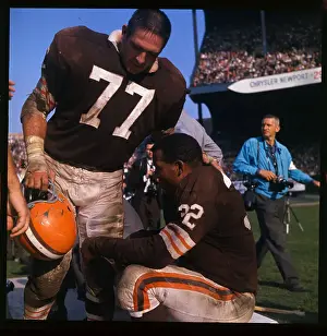 Jim Brown Talking to Dick Schafath