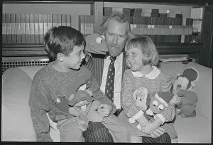 Jim Henson Offering Gifts to Children