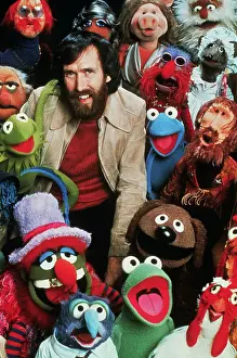 Jim Henson Posing with His Creation Characters