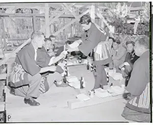 Jim Qiunn Receiving Cup of Saki From Isao Okumura