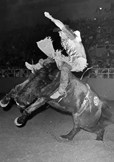 Jim Shoulders Riding a Bucking Horse