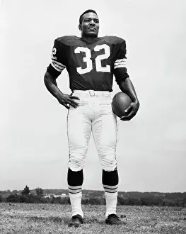 Jimmy Brown Wearing Football Uniform