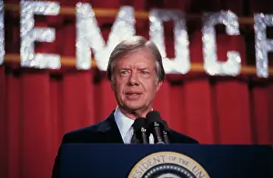 Jimmy Carter Speaking into Microphones