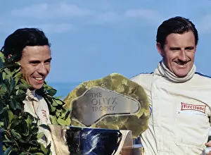Jimmy Clark Smiling with Teammate Graham Hill