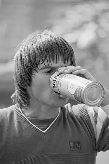 Jimmy Connors Drinking from Ball Can