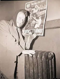 Radiator Prints: Jimmy Durante Bundles Against Cold