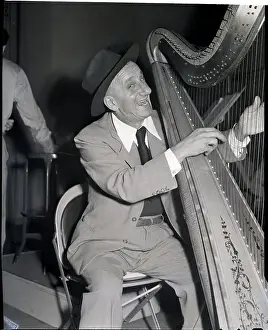 Jimmy Durante Plucking A Harp