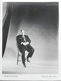 Jimmy Rushing Seated on Stool
