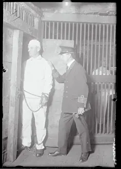 J.J. McNamara Being Put in Cell