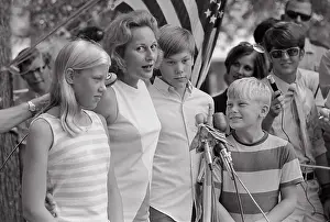 Joan Aldrin and Children Standing Near American Flag